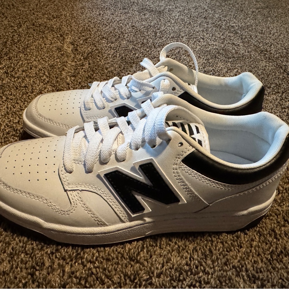 New Balance Women’s White and Black Sneakers